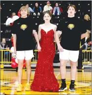  ?? ?? Senior maid Jeryn Carter, daughter of Darryl and Lisa Martinez, escorted by Tate Benoit (left), son of Chad and Jennifer Benoit, and Corbin Bowlin, son of Tony and Julie Dobbs and Brandon Bowlin.