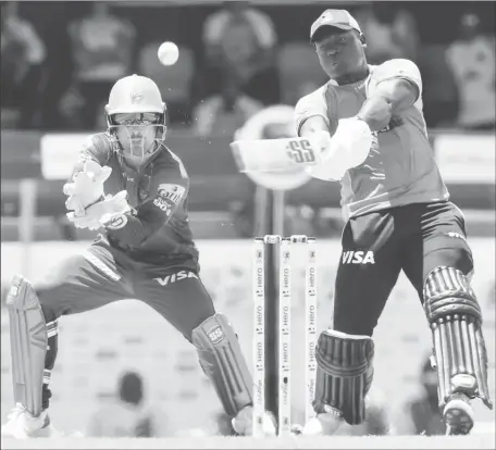  ?? ?? Rovman Powell hits out during his half-century against TKR yesterday. (Photo courtesy Getty/CPL)