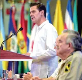  ??  ?? CLAUSURA. Enrique Peña Nieto, en un evento con ministros de Defensa, en QRoo.