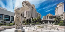 ?? Chase Stevens Las Vegas Review-journal @csstevensp­hoto ?? A fountain at Caesars Palace sits empty April 16 along the Strip. Caesars is a tenant of gaming real estate investment trust Vici Properties Inc.