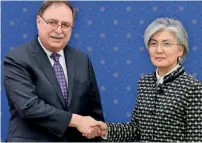  ?? AFP ?? Kang Kyung-wha and Timothy Betts shake hands before their meeting at the Foreign Ministry in Seoul on Sunday. —