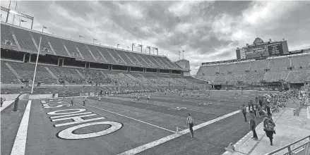  ?? KYLE ROBERTSON/COLUMBUS DISPATCH ?? Amid mostly empty seats, Ohio State kicks off to Nebraska in the first quarter Saturday.