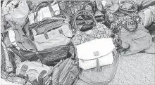  ?? HANDBAGS FOR HOPE ?? Almost 60 gently used purses were donated to the Handbags for Cambridge's Hope program last year and filled with women's hygiene and beauty products. The donations were given to local shelters, including The Bridges and Argus House.