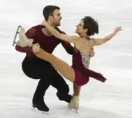  ?? STEVE RUSSELL/TORONTO STAR ?? Eric Radford and Meagan Duhamel’s bronze was Canada’s first medal in pairs since Jamie Salé and David Pelletier in 2002. “It feels like gold,” Duhamel said.