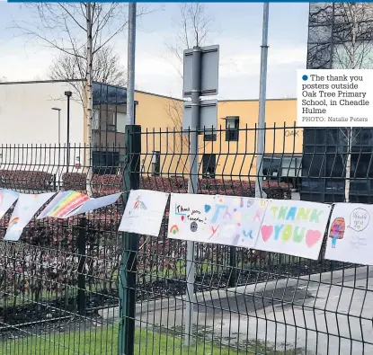  ?? PHOTO: Natalie Peters ?? ●●The thank you posters outside Oak Tree Primary School, in Cheadle Hulme