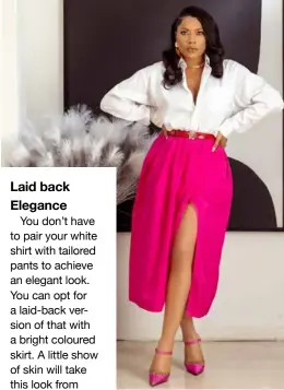  ?? ?? Laid back Elegance
You don’t have to pair your white shirt with tailored pants to achieve an elegant look. You can opt for a laid-back version of that with a bright coloured skirt. A little show of skin will take this look from dowdy to daring.