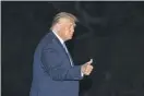  ?? ALEX BRANDON - THE ASSOCIATED PRESS ?? President Donald Trump gives a thumbs-up as he walks from Marine One as he returns to the White House from Texas, Wednesday, July 29, 2020, in Washington.