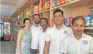  ?? Photo: Charles Chambers ?? From left: Vandhana Sharma and husband Navneet Dutt, with staff, Shamimul Haq, Ronald Madhwan and Setaita Lekanagata inside the new Superette on Fantasy Island.