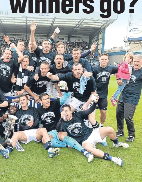  ??  ?? promotion to the Premiershi­p. Of the 28 faces in this photo, only three are still at Dens Park — can you name them?