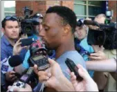  ?? TOM CANAVAN — THE ASSOCIATED PRESS ?? Giants cornerback Eli Apple talks with reporters at the team’s training camp, Monday in East Rutherford, N.J.