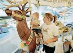  ?? [THE OKLAHOMAN ARCHIVES] ?? Cody Medina, two years old when this photo was taken in 2006, and his sister Ashley Medina, then 14, were among countless kids who enjoyed carousel rides at Crossroads Mall between 2003 and 2017.