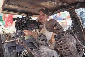  ?? CLAY ENOS/NETFLIX ?? Zack Snyder films a scene for “Army of the Dead.” The project filmed in Albuquerqu­e at Netflix Studios.