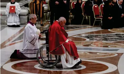  ?? ?? Pope Francis led the celebratio­n of the Passion of the Lord at St Peter's Basilica earlier on Friday, arriving in a wheelchair and praying silently in front of the main altar. Photograph: Alessandra Benedetti/Corbis/Getty Images