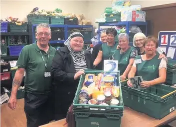  ??  ?? Helping hand Friends of Airdrie and Coatbridge Islamic Centre gave 300kg of items to the Airdrie charity