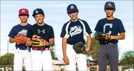  ?? VINCENT OSUNA PHOTO ?? FROM LEFT: Thirteen-year-old local baseball players Emmanuel Trujillo, Anthony Valladolid Jr., Andrew Rivera Jr. and Sergio Omar Gastelum-Gutierrez pose at Stark Field in El Centro on Friday. The four players were selected to play for the Mexico 13u team in the Incheon Internatio­nal Baseball tournament taking place in South Korea later this month.