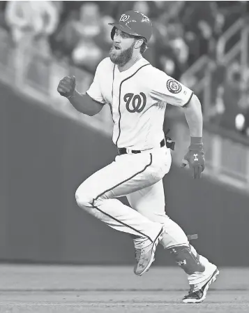  ?? BRAD MILLS, USA TODAY SPORTS ?? Bryce Harper has 20 home runs, 62 RBI and a .318 average for the NL East- leading Nationals.