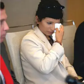  ?? YI-CHIN LEE/AP ?? Ashley Solis, the first woman to file sexual-assault claims against Deshaun Watson, wipes away tears during a news conference Tuesday in Houston.