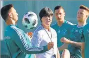  ?? AFP ?? Germany coach Joachim Loew (centre) speaks with his players ahead of their opening match in Vatutinki, near Moscow.