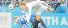  ?? Picture: REUTERS ?? Germany’s Marcel Halstenber­g, right, in action with Estonia’s Nikita Baranov.