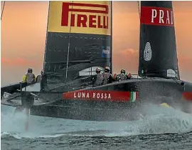  ??  ?? Luna Rossa during a dawn training session in Italy.