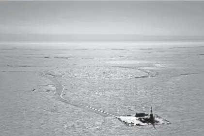  ?? CONOCOPHIL­LIPS VIA AP FILE ?? An aerial photo from 2019 shows an explorator­y drilling camp at the proposed site of the Willow oil project on Alaska’s North Slope.