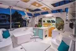  ??  ?? Fountaine Pajot’s Lucia 40 has a more traditiona­l cat accommodat­ion plan, with a generous table and settee in the saloon (above left). The Royal Cape Majestic 530 had the most spacious cockpit and headroom in the 2017 BOTY fleet (above right).