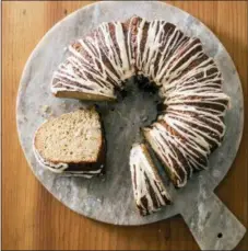  ?? CARL TREMBLAY — AMERICA’S TEST KITCHEN VIA AP ?? This undated photo provided by America’s Test Kitchen in October 2018 shows a cider-glazed apple bundt cake in Brookline, Mass. This recipe appears in the cookbook “All-Time Best Brunch.”