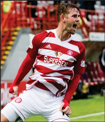  ??  ?? David Templeton sealed the three points in the Lanarkshir­e derby after Marios Ogkmpoe, below, opened scoring