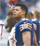  ?? | JOE ROBBINS/ GETTY IMAGES ?? Restricted free agent Cam Meredith received a $ 1.907 million contract from the Bears for 2018.