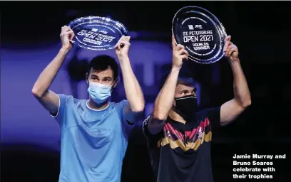  ?? ?? Jamie Murray and Bruno Soares celebrate with their trophies