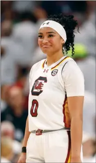  ?? (AP/Nell Redmond) ?? South Carolina guard Te-Hina Paopao scored 21 points while shooting 8 of 12 from the field and hit 5 of 7 from three-point range as the top-ranked Gamecocks remained undefeated this season.