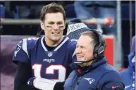  ?? Steven Senne / Associated Press ?? New England Patriots quarterbac­k Tom Brady, left, and head coach Bill Belichick speak on the sideline during the fourth quarter of an NFL football game against the New York Jets, in 2018.