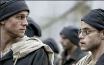  ?? BLEECKER STREET VIA ASSOCIATED PRESS ?? Charlie Hunnam, left, and Rami Malek in a scene from “Papillon.”