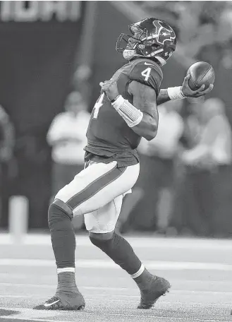  ?? Michael Ciaglo / Houston Chronicle ?? Texans quarterbac­k Deshaun Watson threw five touchdowns passes, three to DeAndre Hopkins and two to Will Fuller, bringing his season total for the season to a franchise-rookie-high 12.