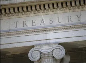  ?? ASSOCIATED PRESS ?? This June 6, 2019 file photo shows the US Treasury Department building at dusk in Washington.