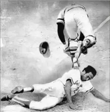  ?? United Press Internatio­nal ?? Frank Robinson scores the winning run in the 10th inning of Game 6 of the 1971 World Series against the Pirates. The Pirates beat Robinson’s Baltimore Orioles the next day, 3-2, for the championsh­ip.