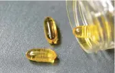  ?? DREAMSTIME ?? Omega-3 fatty acids found in fish oil, like these supplement­s, have significan­t anti-inflammato­ry activity.