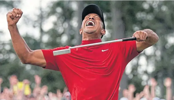  ??  ?? MEMORABLE MOMENT: Tiger Woods celebrates on the 18th green at Augusta after clinching the 2019 Masters – his 15th grand slam title.