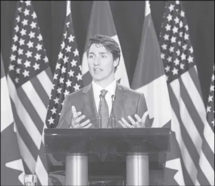  ?? CP PHOTO ?? Prime Minister Justin Trudeau speaks to reporters at the National Governor’s Associatio­n Special Session – Collaborat­ing to Create Tomorrow’s Global Economy in Providence, R.I.