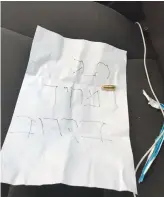  ?? (Gonen Aliasi) ?? A BULLET and threatenin­g note (pictured) were left on the car of Ramat Hasharon Mayor Avi Gruber yesterday.