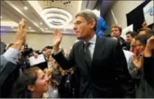  ?? NOAH K. MURRAY — THE ASSOCIATED PRESS ?? Democratic candidate for the House of Representa­tives District 7, Tom Malinowski, celebrates during his election night party in Berkeley Heights, N.J., on Tuesday.