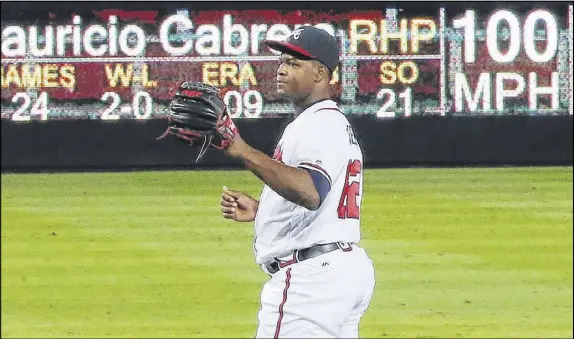  ?? CURTIS COMPTON / CCOMPTON@AJC.COM ?? The Braves’ Mauricio Cabrera is among the hardest-throwing pitchers in the major leagues, and the 6-foot-3, 245-pound reliever is one of only a few pitchers this season who have consistent­ly hit 100 mph.