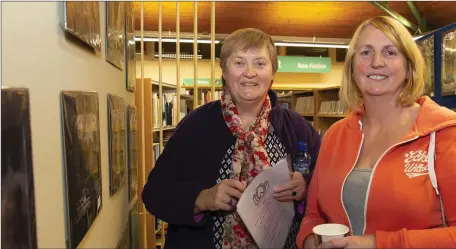  ??  ?? Kathleen Browne, Donamagan and Pam Drennan, Skeoghvost­een, attending the launch of the Thomas P Walsh photograph­ic exhibition in Griaguenam­anagh Library.