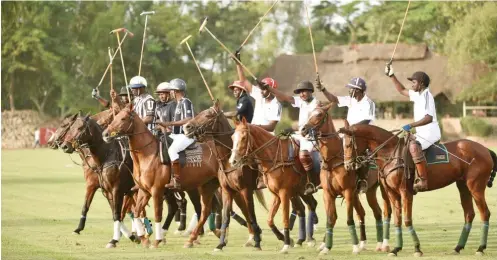  ??  ?? Polo players make the tradional salute before one of the matches in the ongoing Africa Patrons Cup in Kaduna on Tuesday