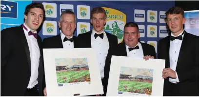  ??  ?? Kerry Stars David Moran, Tommy Walsh and Donnchadh Walsh are presented paintings by Patrick O’Sullivan Kerry County Board Chairman and Stan McCarthy CEO Kerry Group