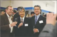  ?? BEA AHBECK/NEWS-SENTINEL ?? MHA Building Systems President and CEO Tatsuya Suzuki, right, City of Lodi Mayor Doug Kuehne, left, and Jun Yamada, Consul-General of Japan, pose for a picture during a ribbon cutting ceremony for MHA Building Systems LLC’s new facility in Lodi on...