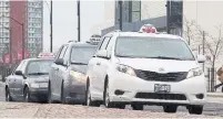  ?? BRYON JOHNSON METROLAND ?? Taxi drivers are asking the City of Mississaug­a for compensati­on for income losses they say are due to ride-sharing companies.