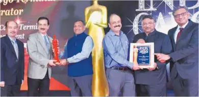  ?? ?? Kamlesh Peri, CEO, Andy Das and Arvind Aggarwal from Celebi Delhi Cargo Terminal Management India Private Limited receive an award during the India Cargo Awards