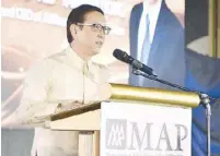  ?? ?? MAP Conference Committee chair Jollibee Foods Corp President and CEO Ernesto Undersecre­tary “Ato” Tanmantion­g. Alma Jimenez.