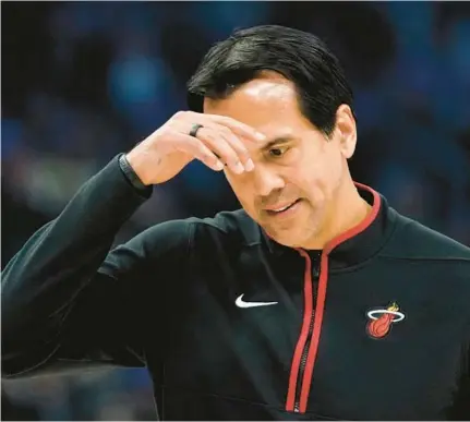  ?? AARON GASH/AP ?? Heat coach Erik Spoelstra says there has to be a better way to attract attention when it comes to calling a late-game timeout.